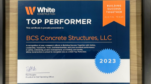 A photo of the 2023 Top Performer Award from White Construction Company.