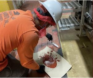 Guy fixing masonry commercial floor
