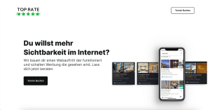 alt="Webseite eines Unternehmens namens 'TOP RATE' mit einer Fünf-Sterne-Bewertung, das Online-Sichtbarkeit und Werbung anbietet. Die Hauptüberschrift lautet 'Du willst mehr Sichtbarkeit im Internet?' gefolgt von einem erläuternden Text. Es gibt einen But