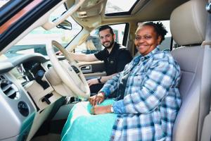 Midas of Tupelo, Oxford and Columbus presents the keys to a Ford Expedition to Lekata Word as part of the Midas Driving Forward program.