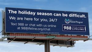 Suicide Loss Survivor Ramps Up Simultaneous Prevention Efforts with 988 Billboard and Lawn Signs
