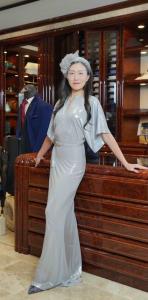 Miist The Singer standing by Fazioli piano at Stefano Ricci Vancouver BC Canada