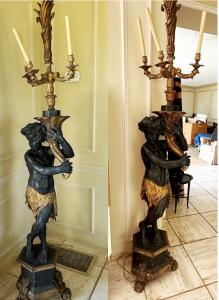 Pair of 19th century carved wood blackamoors, each one 80 inches tall, possibly dating as far back as 1820, at one time were fired by gas (est. $8,000-$15,000).