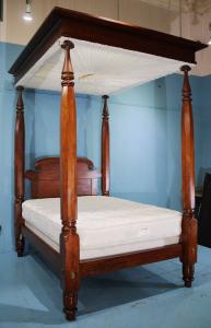 Circa 1840 mahogany Empire full tester plantation bed with a new mattress, 9 feet 1 inch tall by 72 inches long by 55 inches wide (est. $4,000-$6,000).