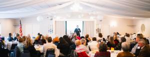 Presidential candidate Ryan Binkley speaks to a room full of Republican women in Iowa.