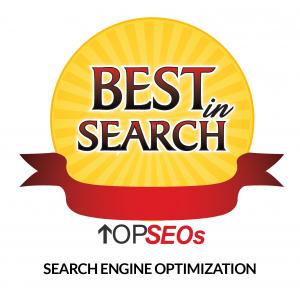 Logo of the 'Best in Search' award by topseos.com, featuring a radiant yellow badge with red accents, proclaiming Nexa Elite as a leader in search engine optimization.