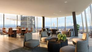 A view of the interior and exterior mountain view Ritz Carlton Residences