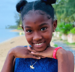 An image of a child supported by Advocates of Love.