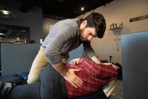 Dr. Nicholas Herbert Adjusting a Patient