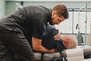 Dr. Jake Williams Adjusting Patient