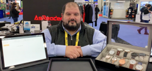 man behind counter with tray