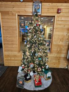 The Choke Cherry Tree Celebrates the Success of the Holiday Giving Tree Event