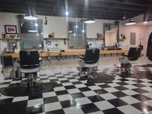 Iconic Broadway Barbers Finds New Home, Maintaining Traditional Barbershop Charm
