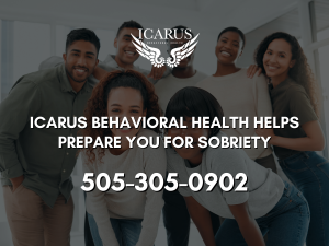 A group of happy people celebrating sobriety shows the concept of Icarus in New Mexico offers evidence based addiction and mental health programs