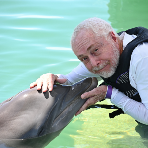 man with dolphin in Florida Keys