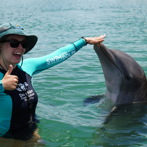 trainer with a Dolphin at Dlphin Connection Florida Keys