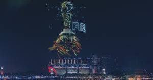 FIFA Cup made of drones above the night city