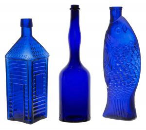 These three legendary three cobalt blue figural bitters will be reunited for the "American Antique Glass Masterpieces" exhibition.