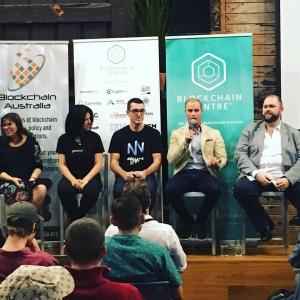 Joe Shew speaking on a panel in Melbourne with some of the biggest names in the crypto space