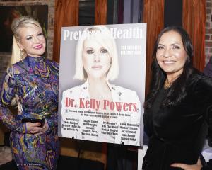 PHM Publisher Angelina Cappiello and Dr. Kelly Powers celebrate her winter cover while bringing awareness to the non-profit, Brain Powers.