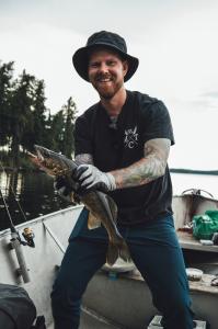 Guest catches Fish at Brownell Wilderness Adventures