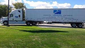 Side view of a tractor trailer used for student training