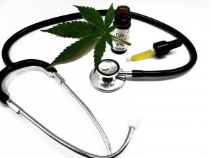 Closeup shot of stethoscope cannabidiol - the concept of alternative medicine