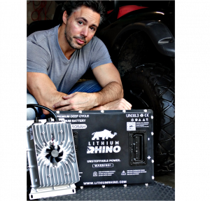 Founder and CEO of Lithium Rhino, Michael McDonald, with Lithium Rhino battery