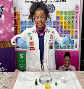 Ava Displaying Her Acid-Base Reaction Ingredients with lab glassware and lab glassware