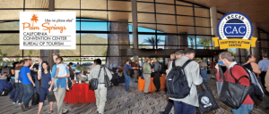 Several people inside the Palm Springs Convention Center.