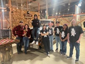 A group photo of the Stumpy's Hatchet House Judson Mill team.