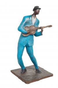 Oil on composition sculpture by William Tolliver (La./Miss., 1951-2000), titled Jazz Guitarist (est. $2,000-$4,000).