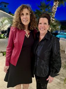 Photo of Leslie Strauss of Spirit Series and Karen Castles Gray at a fundraiser on February 22, 2024.