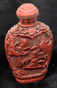 Circa 1780-1880 original carved Chinese cinnabar lacquer snuff bottle that came out of the Hotel House in Tombstone, Arizona in 1882, about 2 ½ inches tall (est. $500-$1,000).