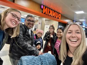 A refugee family is happy to be safe in america, arriving at the airport