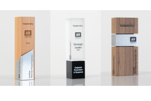Three Trophies with the inscription of Kaspersky Certified Advanced Threat Protection, Endpoint Prevention and Response, Anti-Tampering Protection 2023 and the logo of AV-Comparatives