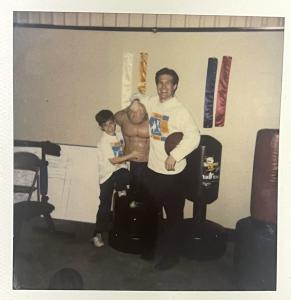 Image of old (1990's) Polaroid photo: Gray Stream learned firsthand the benefits of youth mentoring programs while volunteering with Big Brothers Big Sisters of Southwest Louisiana as a Big Brother.