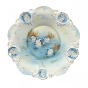 Rare swan center bowl marked R.S. Prussia in the Icicle & Medallion mold, 15 inches in diameter with five medallions featuring swans along with a center scene (est. $2,000-$4,000).