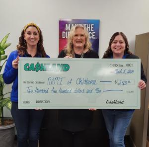Cashland Holdings' Donation Check
