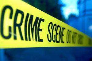Crime scene tape surrounds a fundraising crime scene