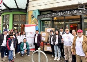 Group of INC Giving volunteers with boxes of winter clothing donations to the Downtown Eastside Women’s Shelter