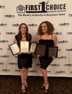 Image of Adrianna Smith and Lana Hout holding their awards