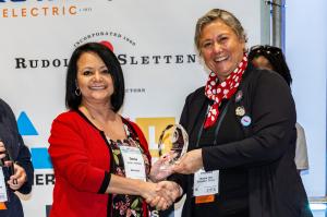 Presentation of past Rosie the Riveter Certification Award  to Skanska