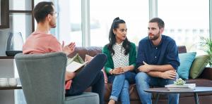 couples talking to therapist.