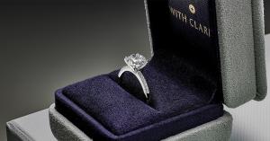 With Clarity Custom Diamond Rings in a box