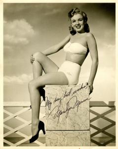 PSA/DNA graded 10 vintage black and white pin-up photograph of Marilyn Monroe, taken circa 1947, the first known instance of her signing a photo as “Marilyn Monroe,” using her recently adopted stage name (est. $28,000-$35,000).