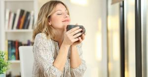 Photo of a woman relaxing with a coffee