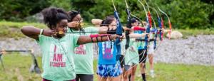 Kids doing archery at summer camp near Charlottesville, VA