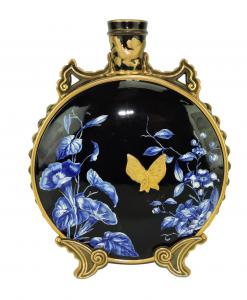 Large, circa 1875 Royal Worcester Aesthetic Movement moon flask decorated with blue and white Japanese style fauna and a 22-carat gilded butterfly, all against a black ground (est. $1,500-$2,500).