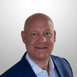 Headshot of Joseph "Joe" Strickland III, Chief Underwriting Officer at ARU